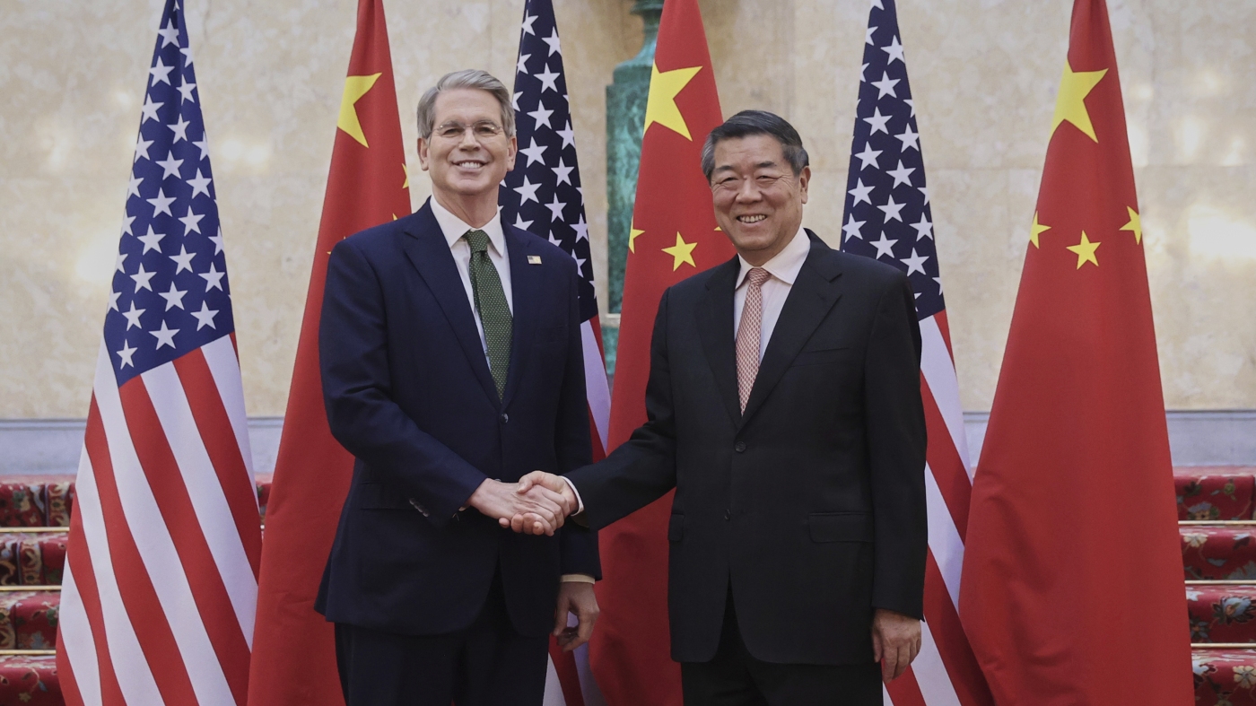 美国 - 中国贸易谈判以解决争议的协议结束：NPR
