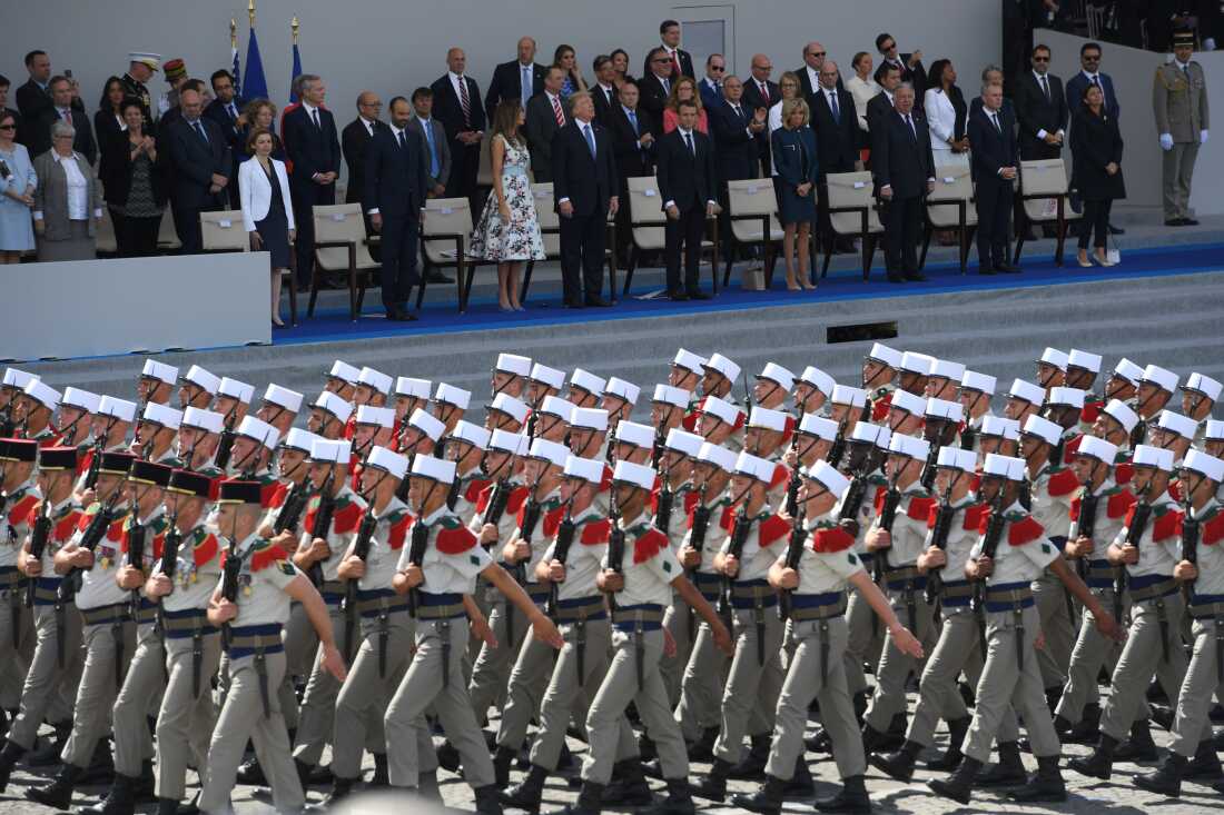 (FromL) French Defence Minister Florence Parly, French Prime Minister Edouard Philippe, US President Donald Trump and his wife First Lady Melania Trump, French President Emmanuel Macron and his wife Brigitte Macron, Senate President Gerard Larcher, the President of the French National Assembly Francois de Rugy and the Mayor of Paris Anne Hidalgo watch the Bastille Day military parade on July 14, 2017.