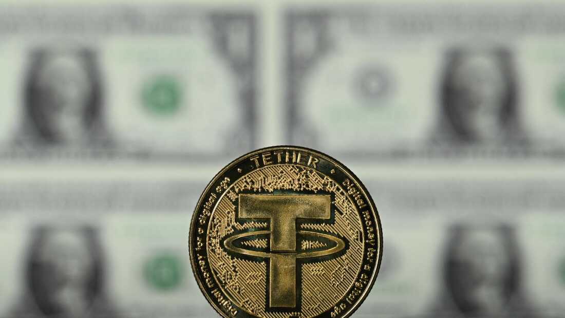 2022年5月8日在伦敦拍摄的插图图片显示了一枚纪念品系绳（USDT）硬币，这是世界上最大的稳定者之一。